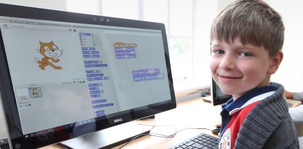 Young student learning coding basics on a computer